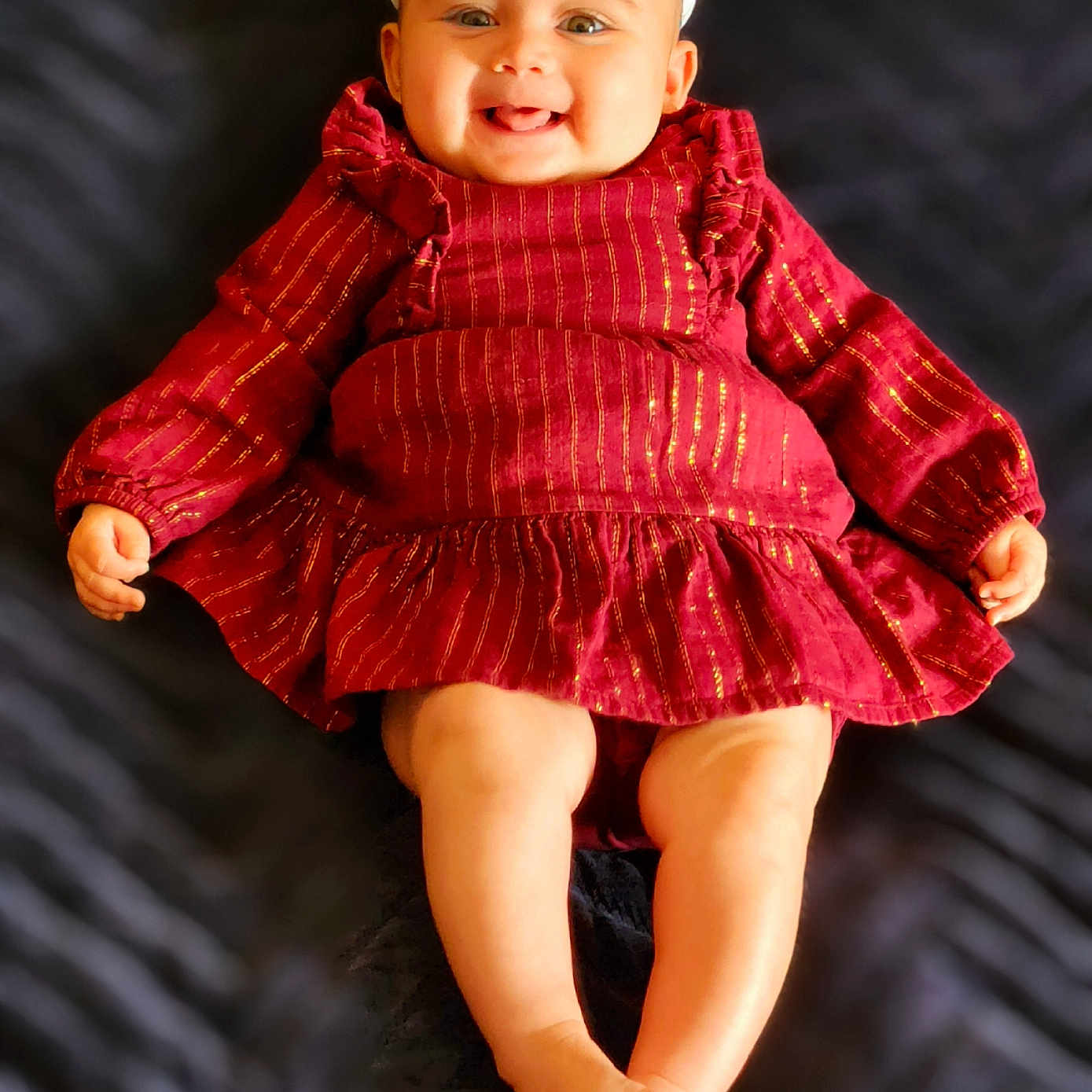 Hazel Stagner joined the competition — help win amazing prizes! baby, bodypart, bonnet, cap, clothing, coat, dress, face, finger, formalwear, hand, happy, hat, head, pants, person, photography, portrait, sitting, smile