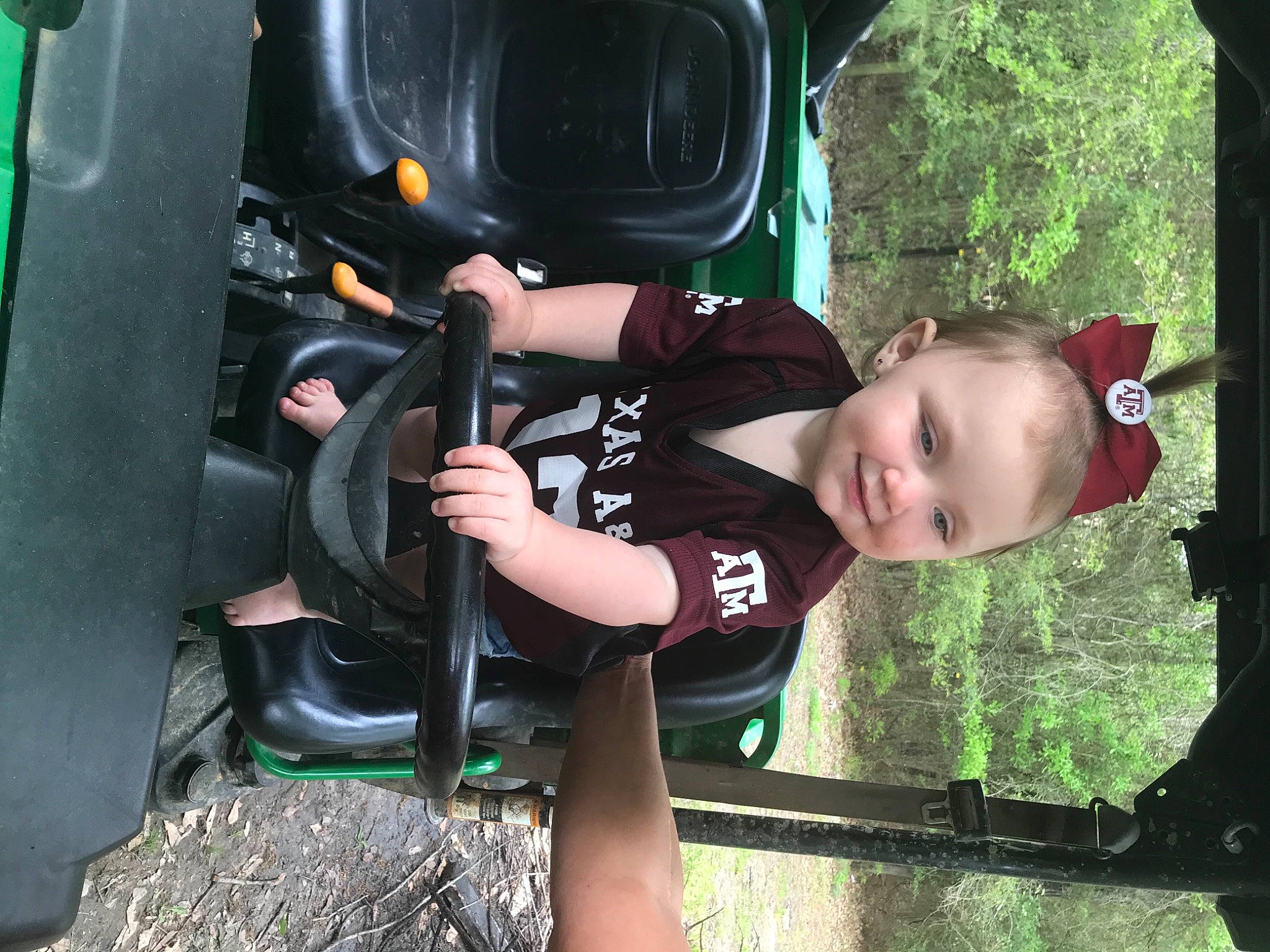 Izzie is registered to the contest to win money with this photo: auto_part, automotive_design, automotive_exterior, automotive_lighting, automotive_tire, automotive_wheel_system, baby_toddler_clothing, bumper, child, family_car, flash_photography, fun, joy, leisure, motor_vehicle, person, plant, toddler, tree, vehicle