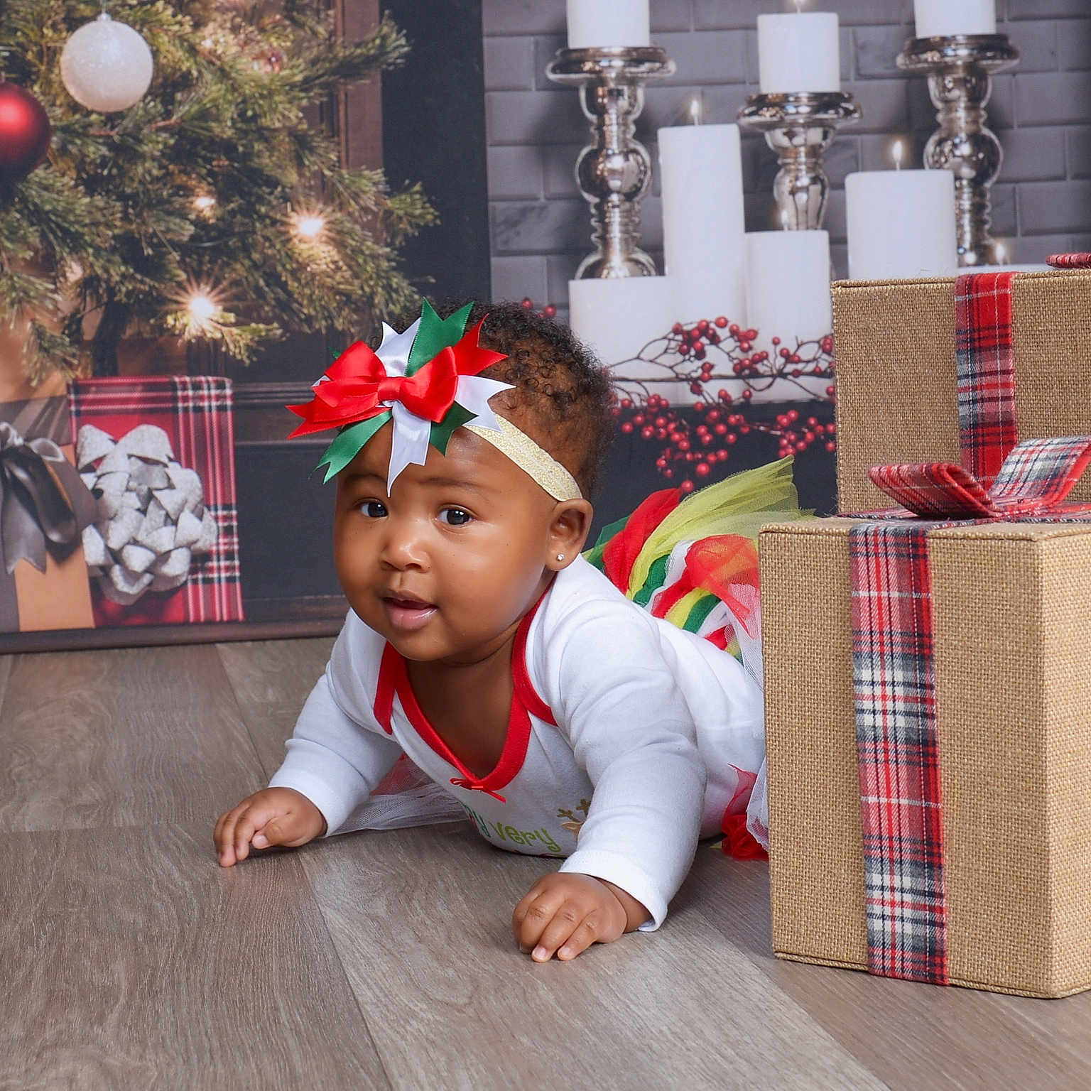 Kah'Loni joined the competition — help win amazing prizes! baby, babycrawling, box, candle, christmas, crawling, face, festival, hardwood, head, openingpresent, person, wood