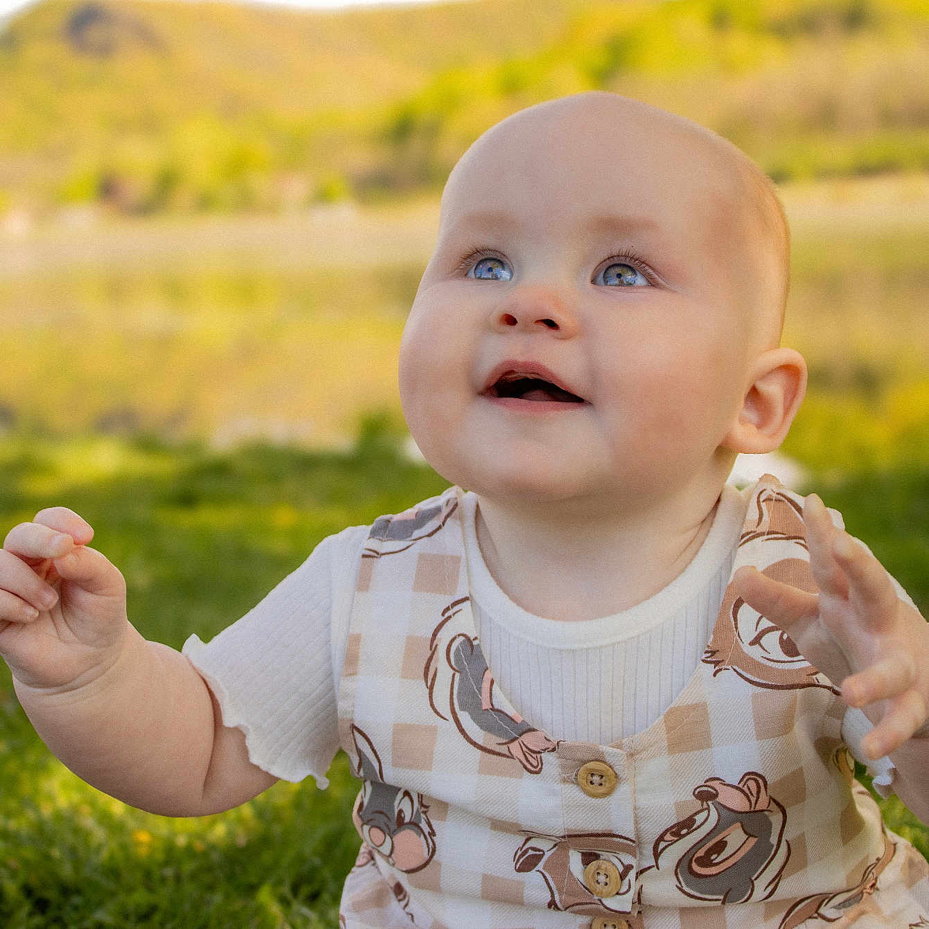 Haisley joined the competition — help win amazing prizes! baby, bodypart, clothing, dress, face, finger, grass, hand, happy, head, lawn, longsleeve, person, photography, plant, portrait, sitting, sleeve, smile, t_shirt