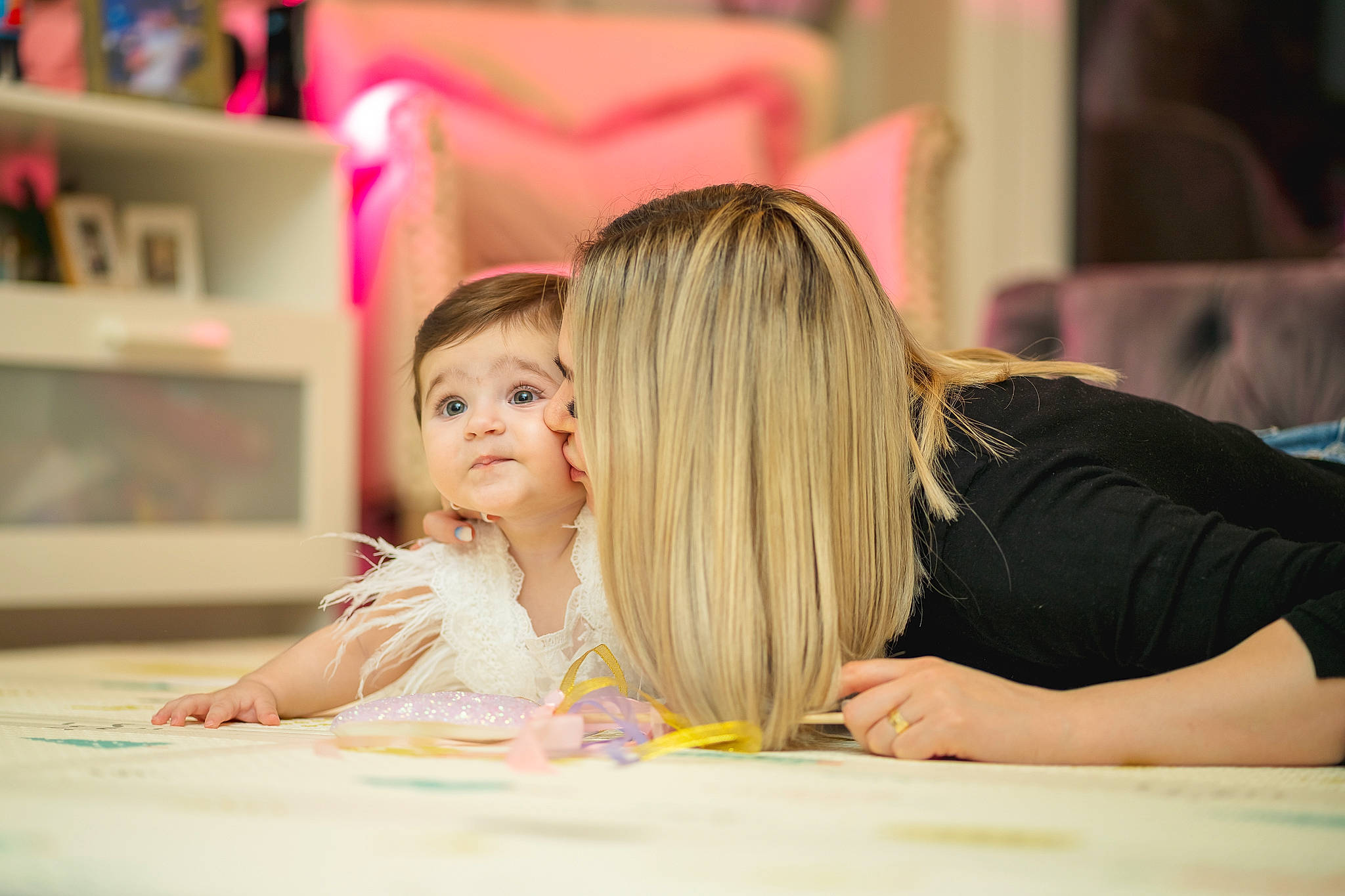 Miruna joined the competition — help win amazing prizes! baby, chair, child, desk, event, facial_expression, flooring, fun, hairstyle, hand, happy, leisure, people, person, play, room, sitting, skin, table, toddler