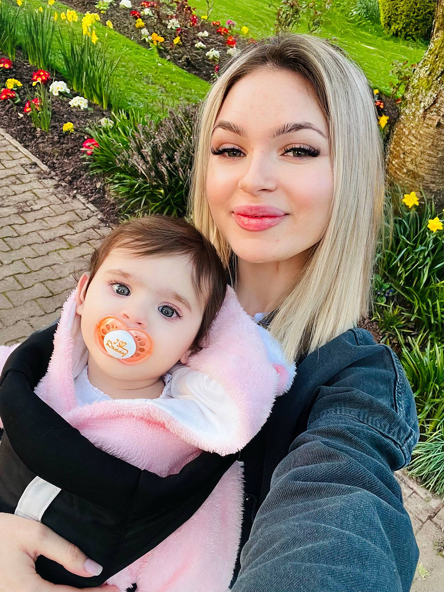 Miruna is registered to the contest to win money with this photo: baby, beauty, dress, eye, flower, fun, grass, hair, hairstyle, happy, iris, joy, leisure, lip, people_in_nature, person, plant, skin, smile, toddler