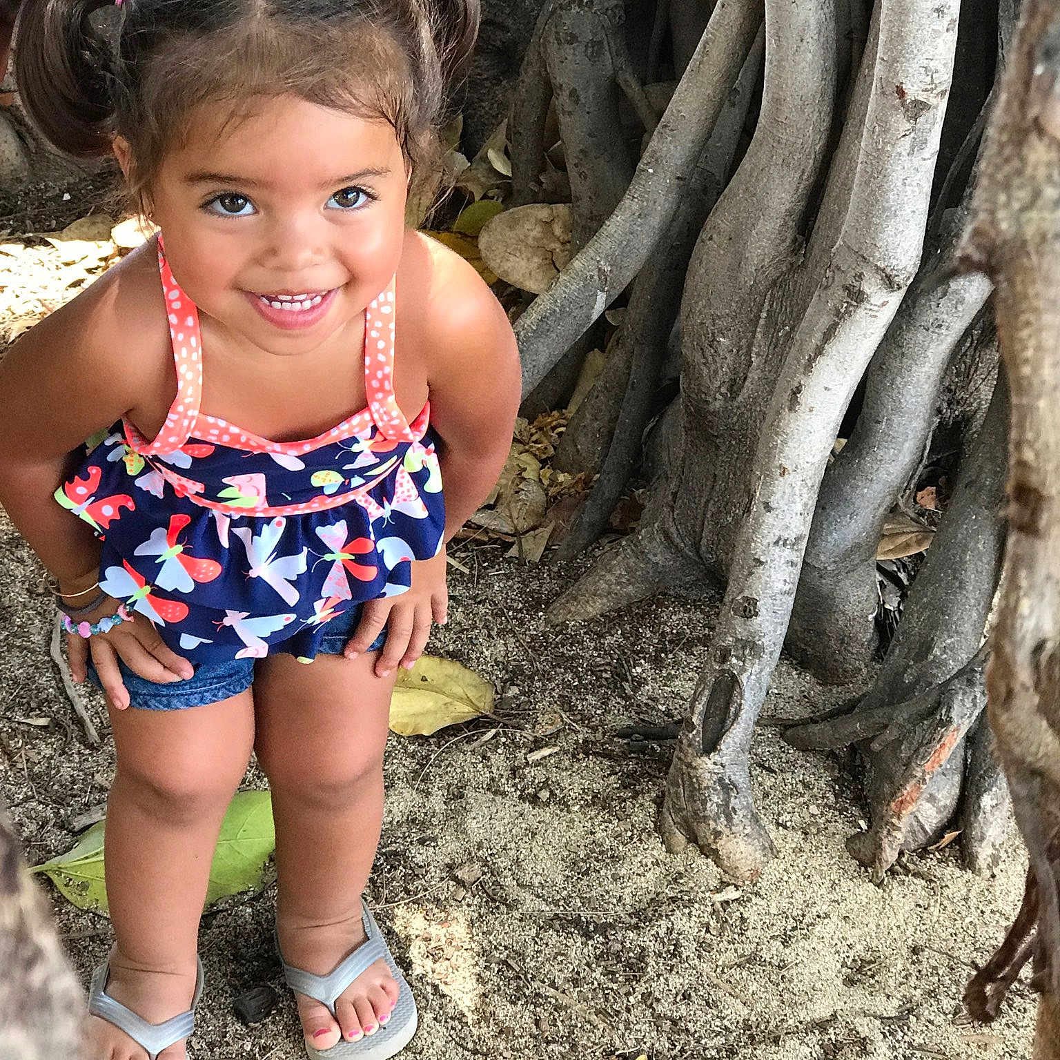 Malie is registered to the contest to win money with this photo: child, eye, fun, girl, happiness, joy, pattern, person, plant, play, skin, smile, soil, toddler, tree, vacation