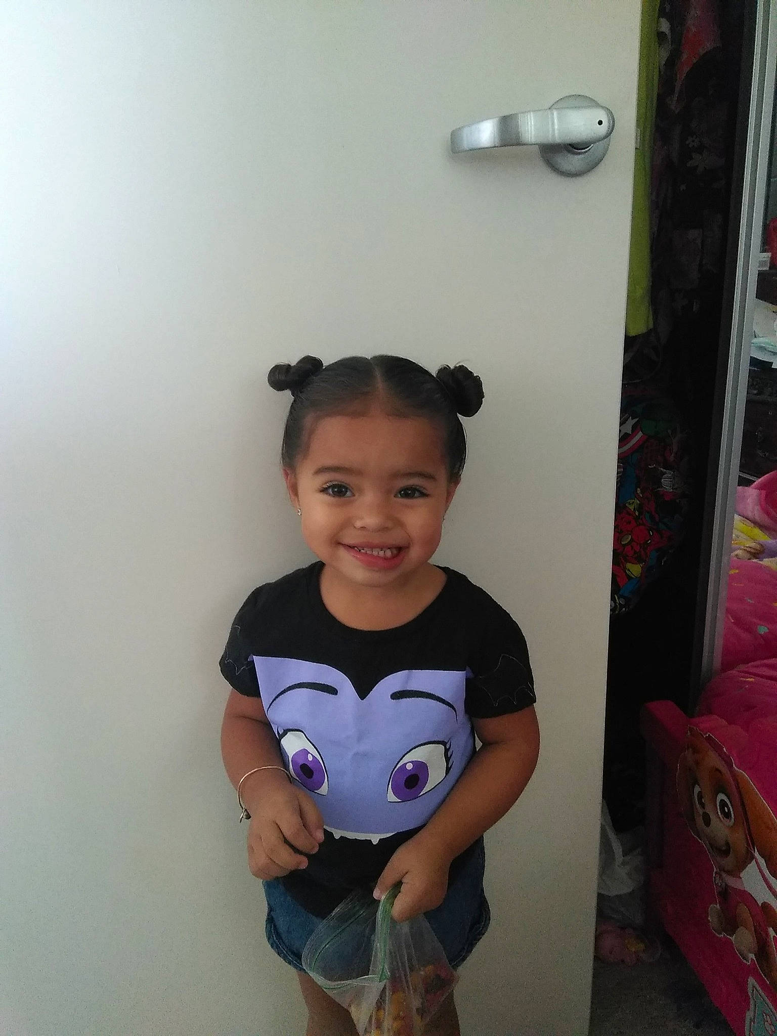 Malie is registered to the contest to win money with this photo: arm, child, cool, day, fun, girl, hairstyle, headgear, joy, organ, person, pink, product, purple, shoulder, skin, smile, snapshot, standing, t_shirt