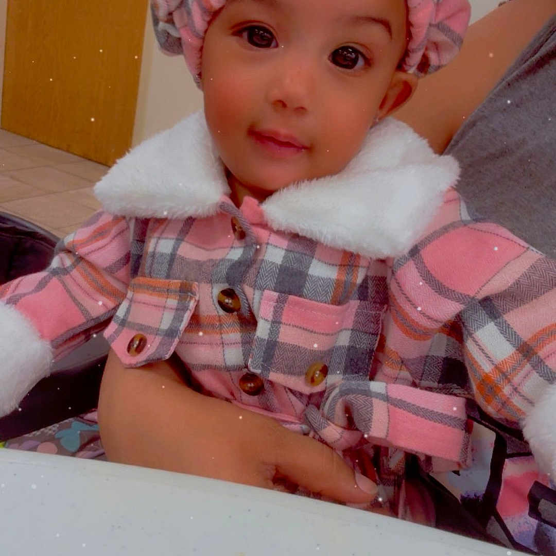 Kinslee joined the competition — help win amazing prizes! baby, bathing, bathtub, bonnet, cap, clothing, coat, costume, doll, dress, face, glove, hat, head, jacket, person, photography, portrait, toy, tub