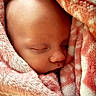 newborn, baby, sleeping, blanket, soft_texture, pink, white, face, peaceful, wrapped, infant, closeup, skin, head, cozy, rest, child, portrait, tender, warm