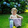 baby, baby_powder, child, cute, flowers, funny_face, grass, greenery, hydrangea, metal_tub, nature, outdoor, pink_towel, playful, rubber_duck, scrunched_face, summer, towel, tub, yellow_duck