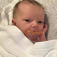 Marceline Rae joined the competition — help win amazing prizes! baby, newborn, pacifier, towel, wrapped, infant, face, skin, hair, cute, sleepy, indoors, child, person, resting, blanket, young, small, peaceful, portrait