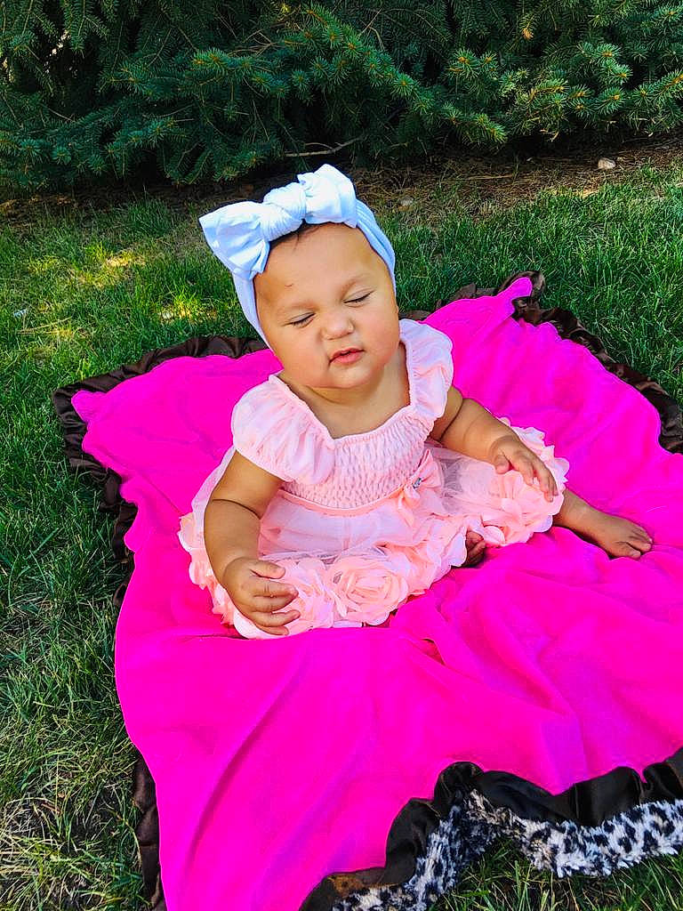 Analyse joined the competition — help win amazing prizes! baby, child, costume, dress, fun, grass, hair_accessory, happy, headgear, headwear, magenta, person, photography, pink, plant, purple, sitting, skin, smile, toddler