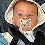 Gabriel participe au concours pour gagner de l'argent avec cette photo : baby, child, pacifier, car_seat, harness, hooded_jacket, blue_eyes, infant, close_up, cute, face, straps, clothing, indoors, young_child, sitting, comfort, soft_lighting, portrait, secure