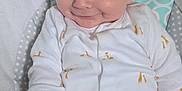 Louie joined the competition — help win amazing prizes! baby, infant, smiling, onesie, giraffe_pattern, baby_seat, cozy, cute, hand, face, blue_eyes, soft_fabric, clothing, child, portrait, indoor, cute_expression, sitting, light_skin, blond_hair