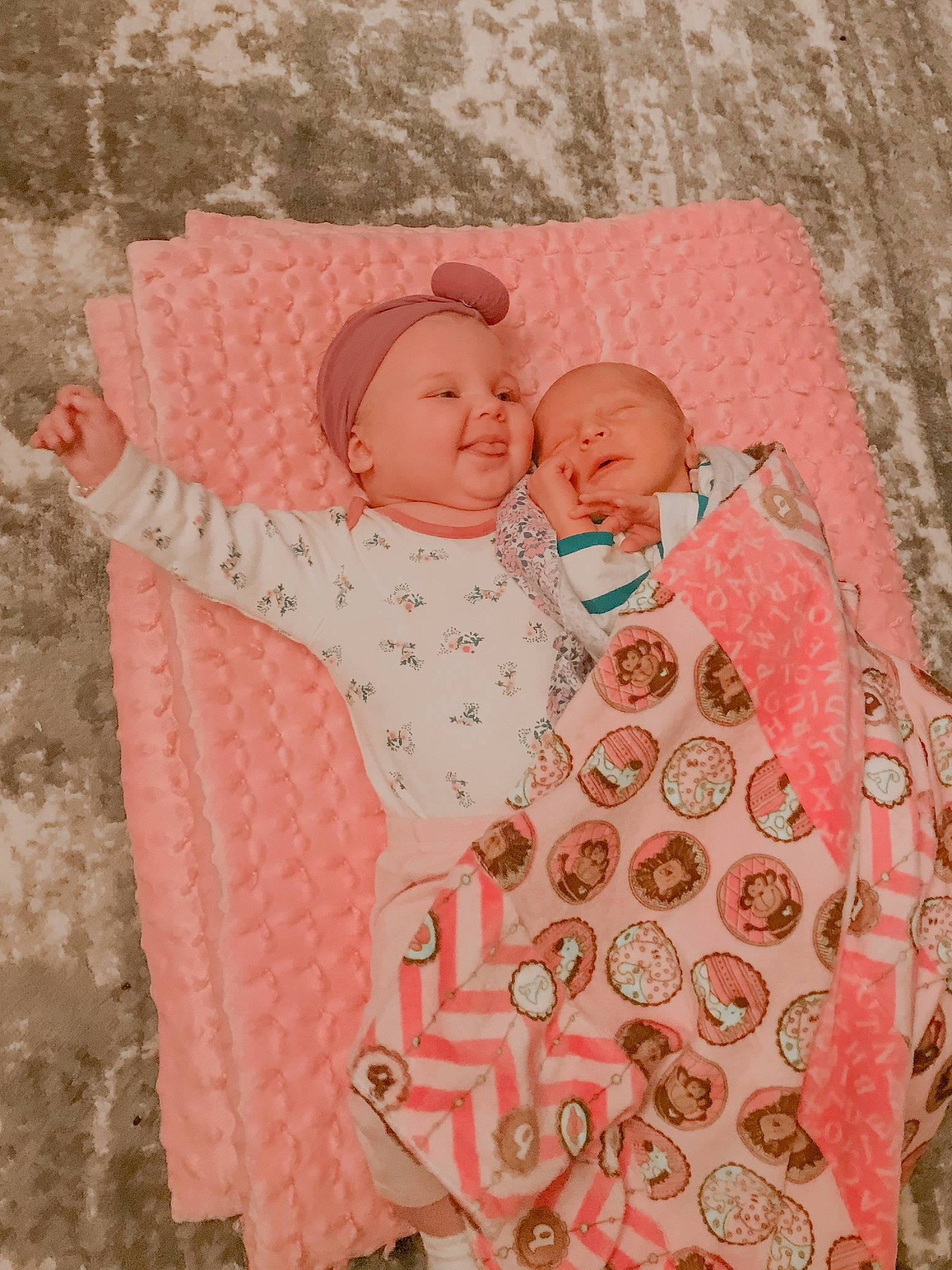 Scottie is registered to the contest to win money with this photo: art, baby, bedding, blanket, child, design, joy, linens, pattern, peach, person, pink, product, quilt, sleep, textile, toddler