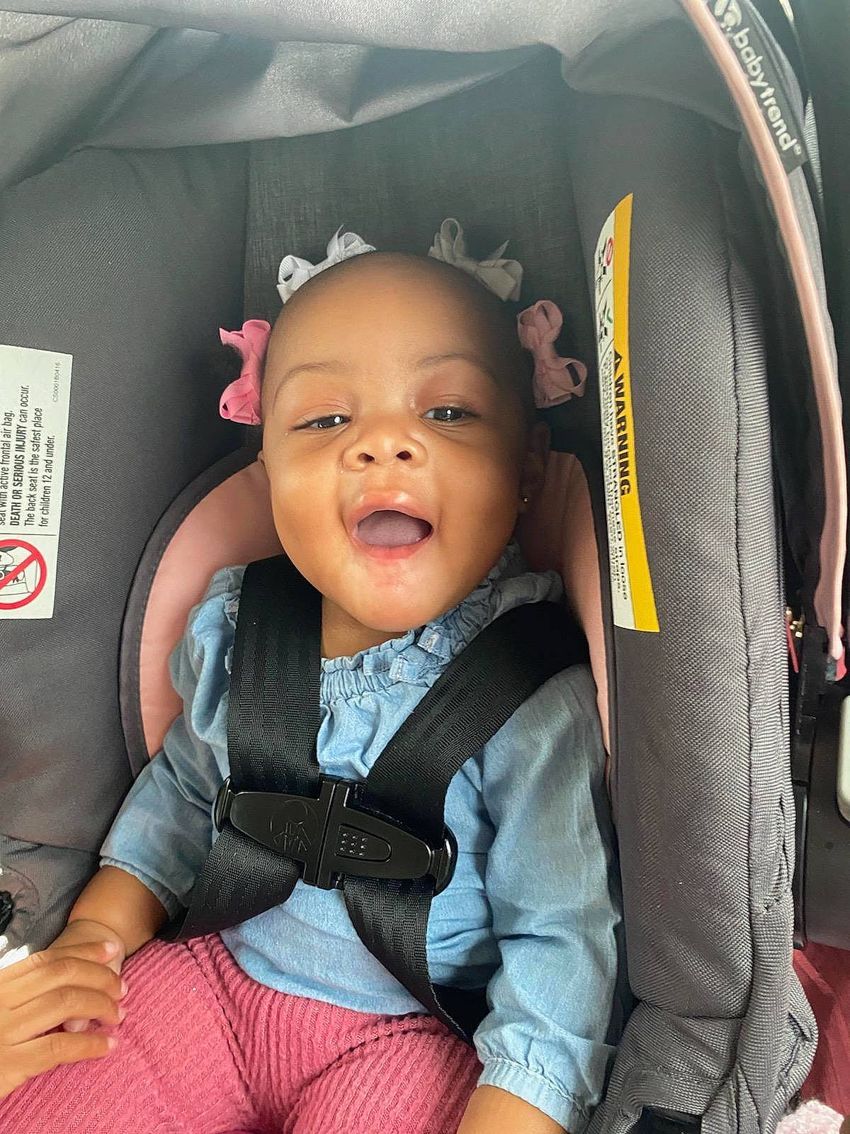 Nylaih is registered to the contest to win money with this photo: auto_part, baby, baby_carriage, baby_toddler_clothing, beauty, black, car_seat, car_seat_cover, child, comfort, cool, fun, gesture, happy, person, product, sitting, smile, thumb, toddler