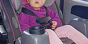 Victoria joined the competition — help win amazing prizes! black_shoes, car, car_interior, car_seat, child, child_safety, curious, daylight, footwear, pink_bows, pink_pants, purple_sweater, restraint, safety_harness, seat, seatbelt, toddler, vehicle, window, young_girl
