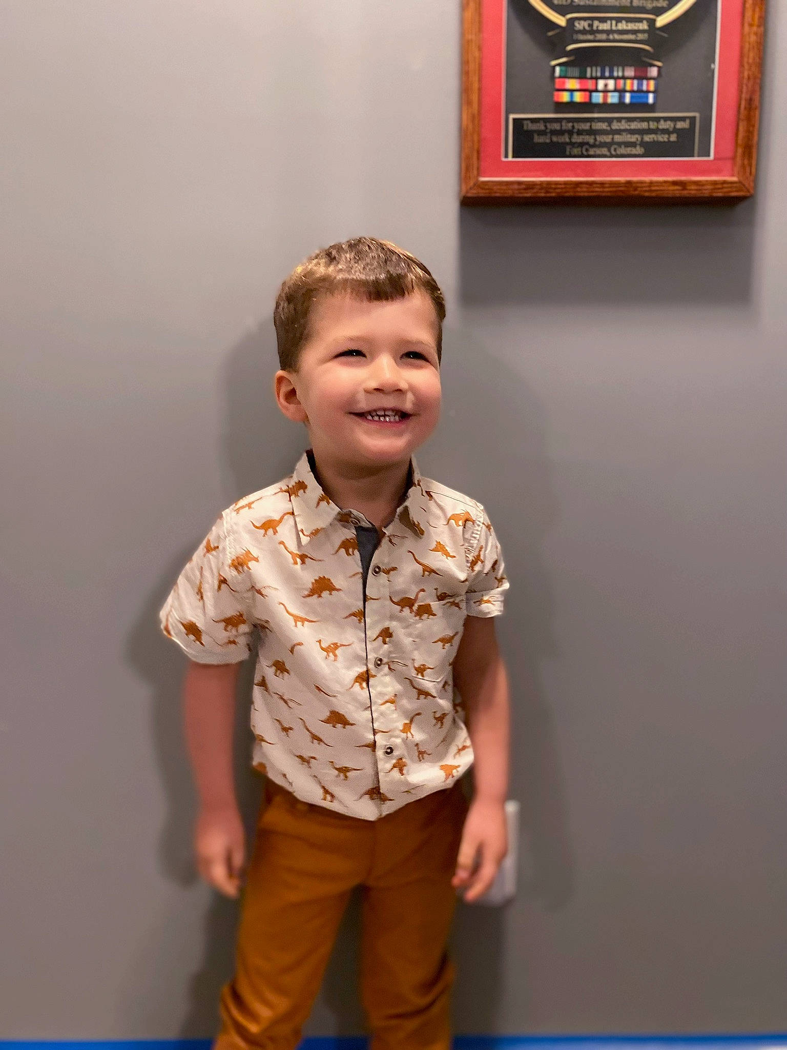 Patryk joined the competition — help win amazing prizes! art, baby_toddler_clothing, child, dress_shirt, event, fashion_design, flooring, fun, happy, human_body, joy, orange, pattern, person, picture_frame, room, sleeve, smile, standing, t_shirt