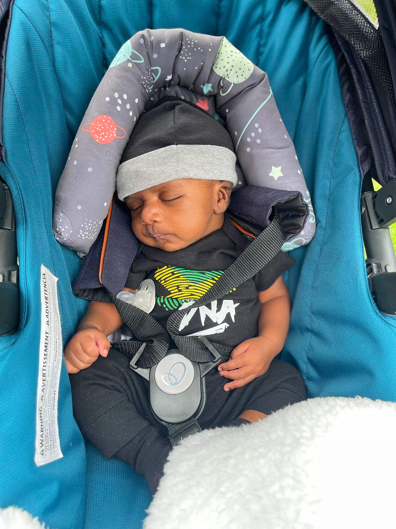Kai joined the competition — help win amazing prizes! baby, baby_carriage, baby_in_car_seat, baby_products, baby_safety, baby_sleeping, baby_toddler_clothing, bag, car_seat, child, comfort, cool, electric_blue, fashion_accessory, fun, headwear, person, product, sitting, sleeve