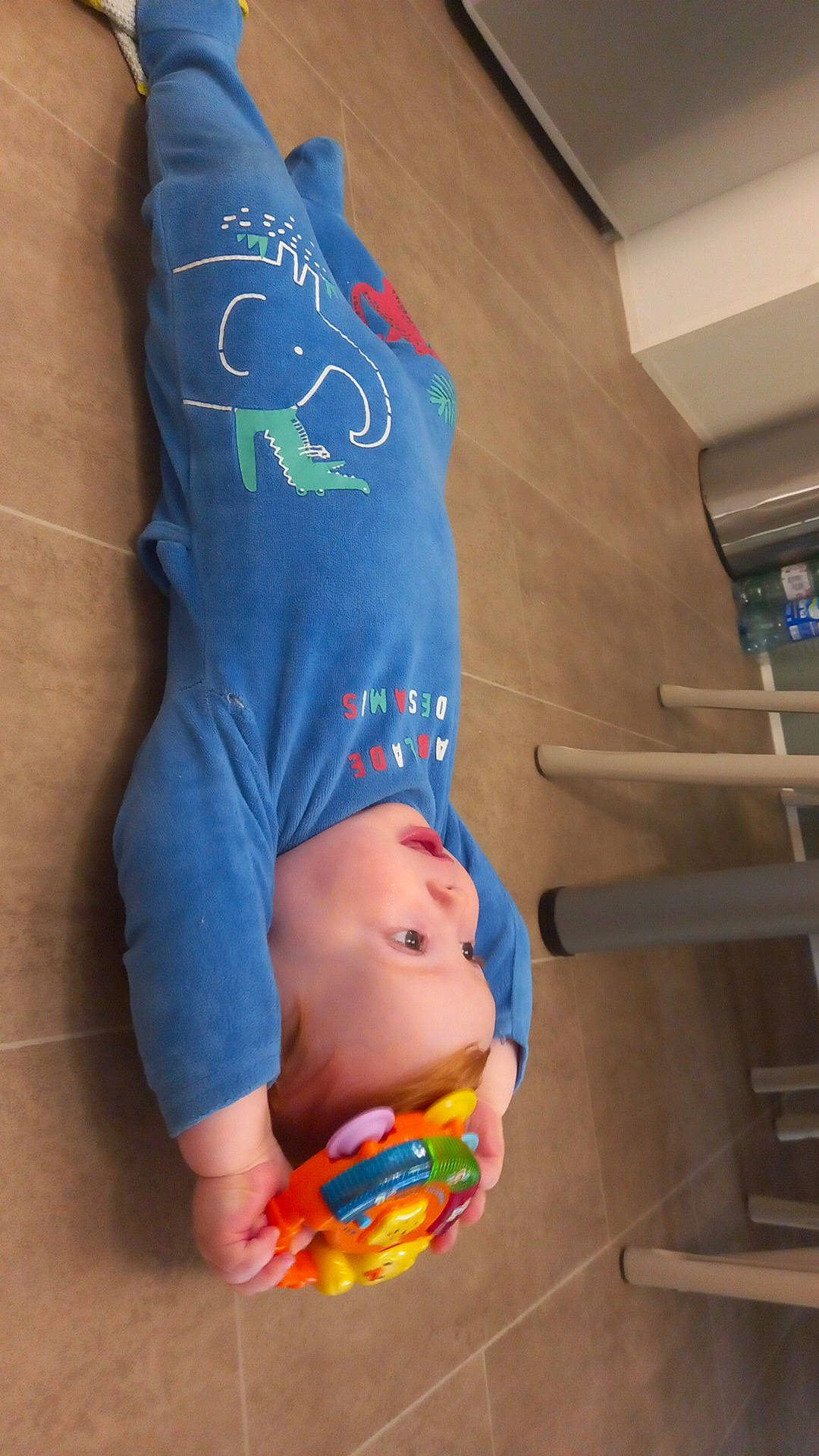 Millan participe au concours pour gagner de l'argent avec cette photo : abdomen, baby, baby_toddler_clothing, chest, comfort, elbow, electric_blue, flooring, fun, human_leg, knee, leisure, mouth, person, sleeve, sportswear, textile, thigh, toddler, trunk