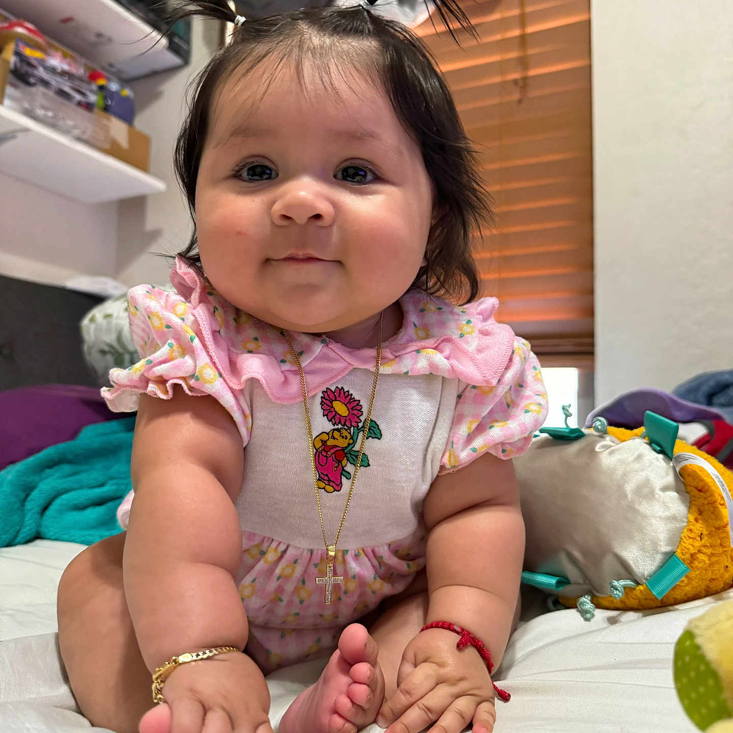 Aubree is registered to the contest to win money with this photo: accessories, baby, bed, bedroom, bodypart, bracelet, couch, face, finger, furniture, hand, head, indoors, jewelry, necklace, person, photography, portrait, room, sitting