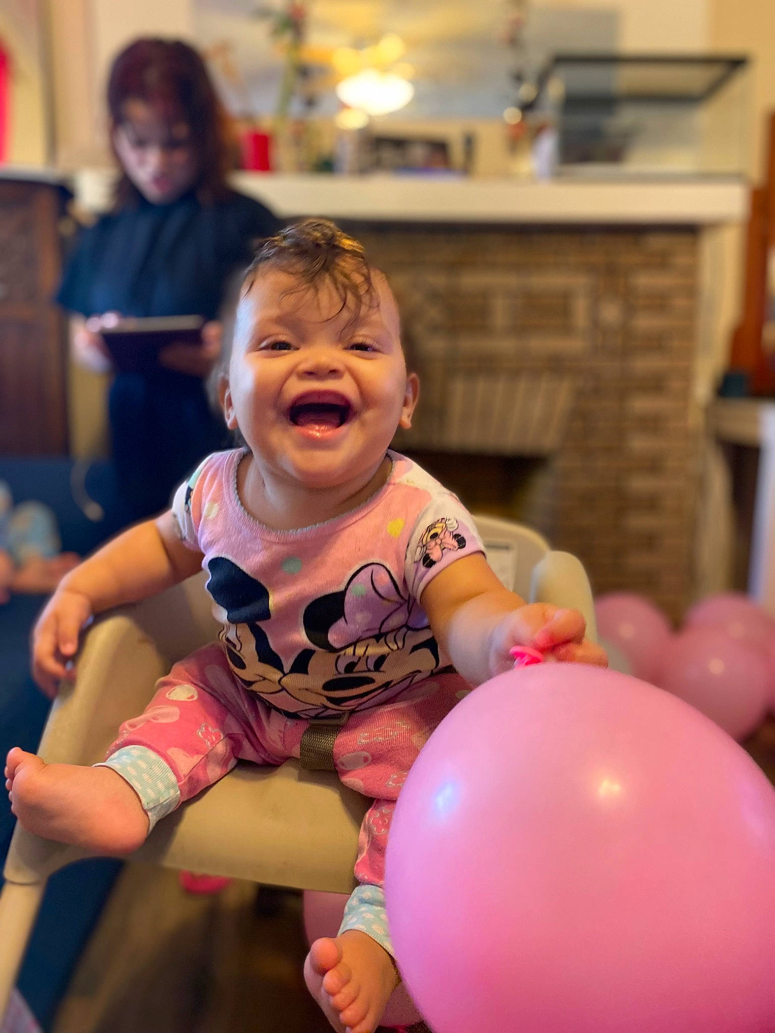 Azalea is registered to the contest to win money with this photo: baby, balloon, child, entertainment, event, fun, happy, human_leg, leisure, magenta, party, party_supply, people, person, pink, recreation, shorts, sitting, smile, t_shirt