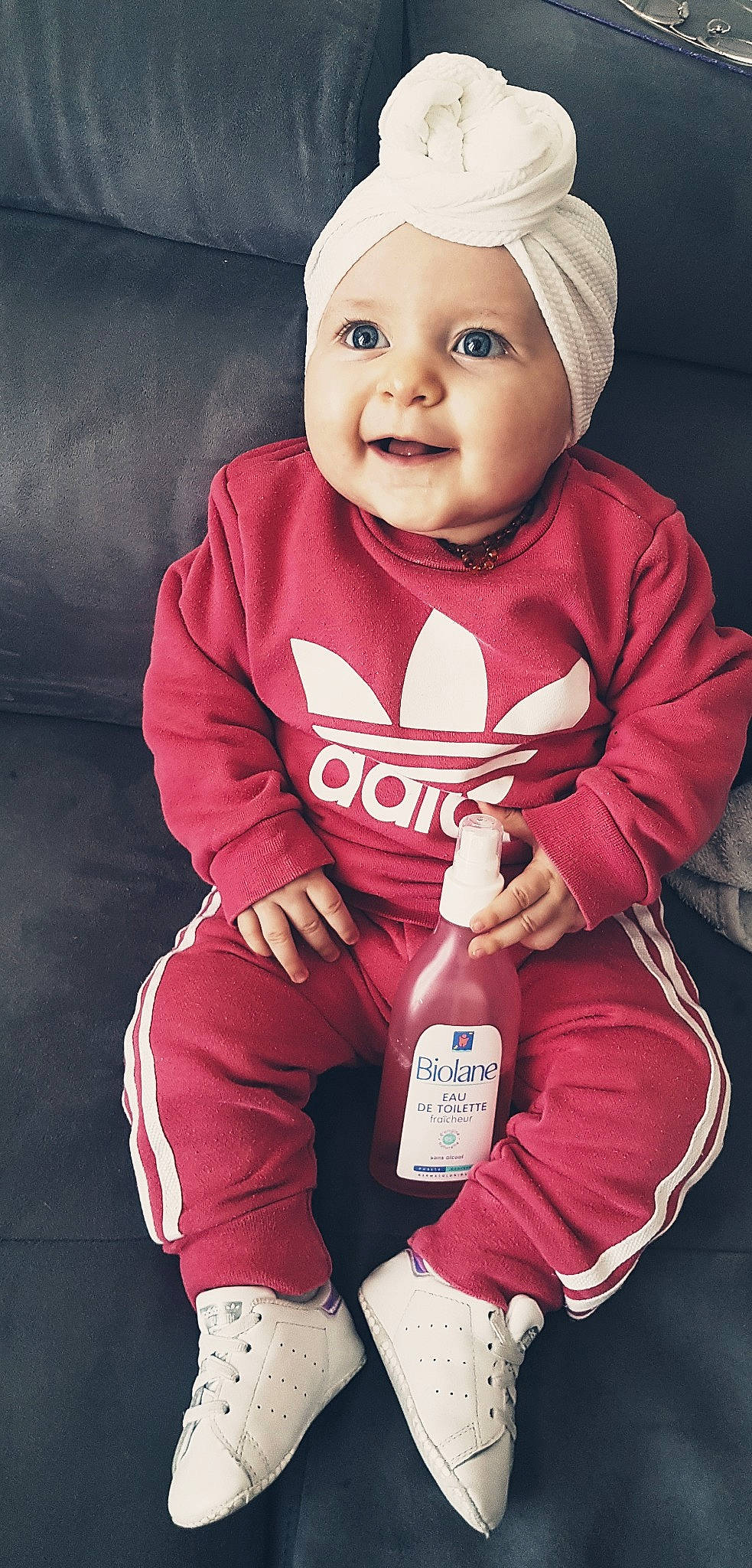 Maëlia a rejoint le concours — aidez-le/la à gagner de superbes lots ! baby, baby_toddler_clothing, cap, cheek, child, cool, eye, face, facial_expression, happy, head, headwear, human_body, person, pink, red, skin, sleeve, smile, t_shirt