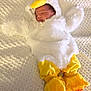 Cole joined the competition — help win amazing prizes! baby, sleeping, costume, chicken, yellow, white, soft, blanket, cute, infant, clothing, footwear, texture, resting, child, indoors, portrait, cozy, fluffy, animal_theme