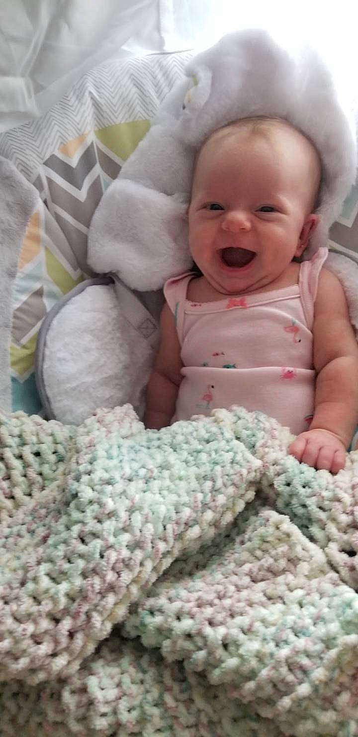 Huntleigh joined the competition — help win amazing prizes! art, baby, baby_sleeping, blanket, child, craft, crochet, knitting, linens, pattern, person, product, textile, toddler, wool, woolen