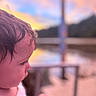 Zion joined the competition — help win amazing prizes! child, toddler, profile, face, hair, looking_away, indoor, window, sunset, pastel_colors, soft_focus, portrait, close_up, side_view, sitting, white_shirt, arm, hand, blurred_background, warm_lighting