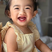 Sapphire Love Louise joined the competition — help win amazing prizes! toddler, child, smiling, happy, pigtails, yellow_bows, yellow_dress, striped_clothing, indoor, portrait, cute, baby, face, person, infant, young_child, skin, hair, sitting, arm