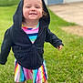 Astella joined the competition — help win amazing prizes! toddler, child, hoodie, rainbow_stripes, dress, grass, outdoor, smile, happy, young, barefoot, person, face, walking, summer, casual_clothing, greenery, cute, playful, daytime
