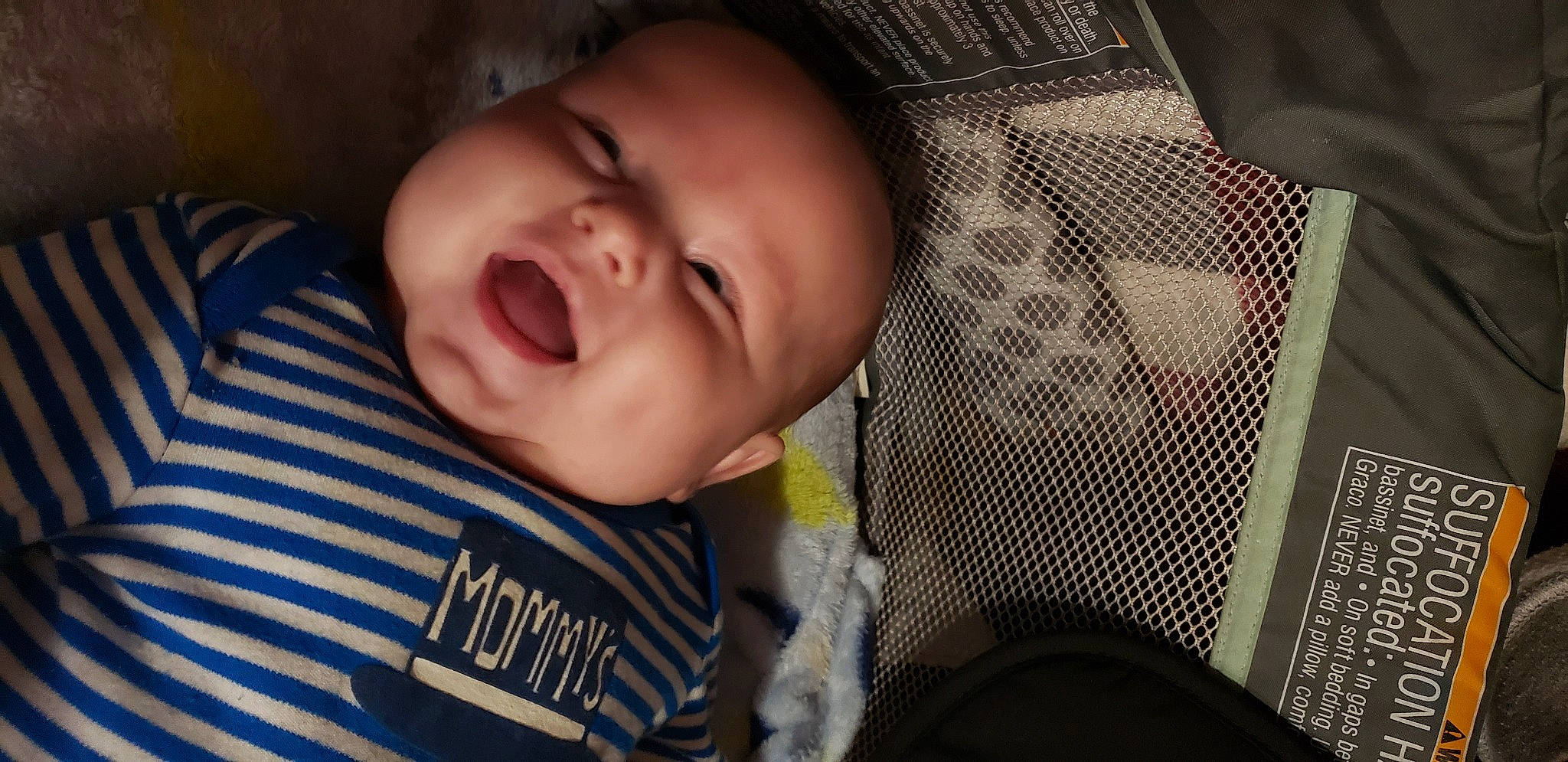 Justin is registered to the contest to win money with this photo: baby, baby_toddler_clothing, cheek, chin, comfort, eye, eyebrow, facial_expression, hairstyle, head, iris, lip, mouth, nose, person, product, skin, sleeve, smile, textile