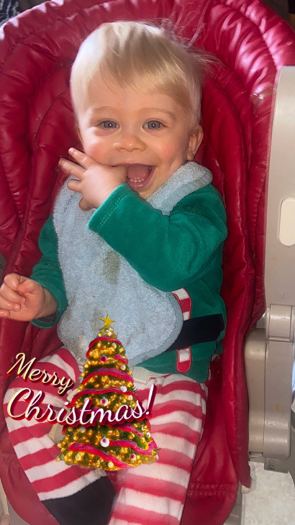 Juliann participe au concours pour gagner de l'argent avec cette photo : baby, baby_products, baby_toddler_clothing, child, christmas, christmas_decoration, christmas_eve, christmas_ornament, comfort, event, face, fictional_character, happy, holiday, holiday_ornament, lap, person, sitting, sleeve, smile