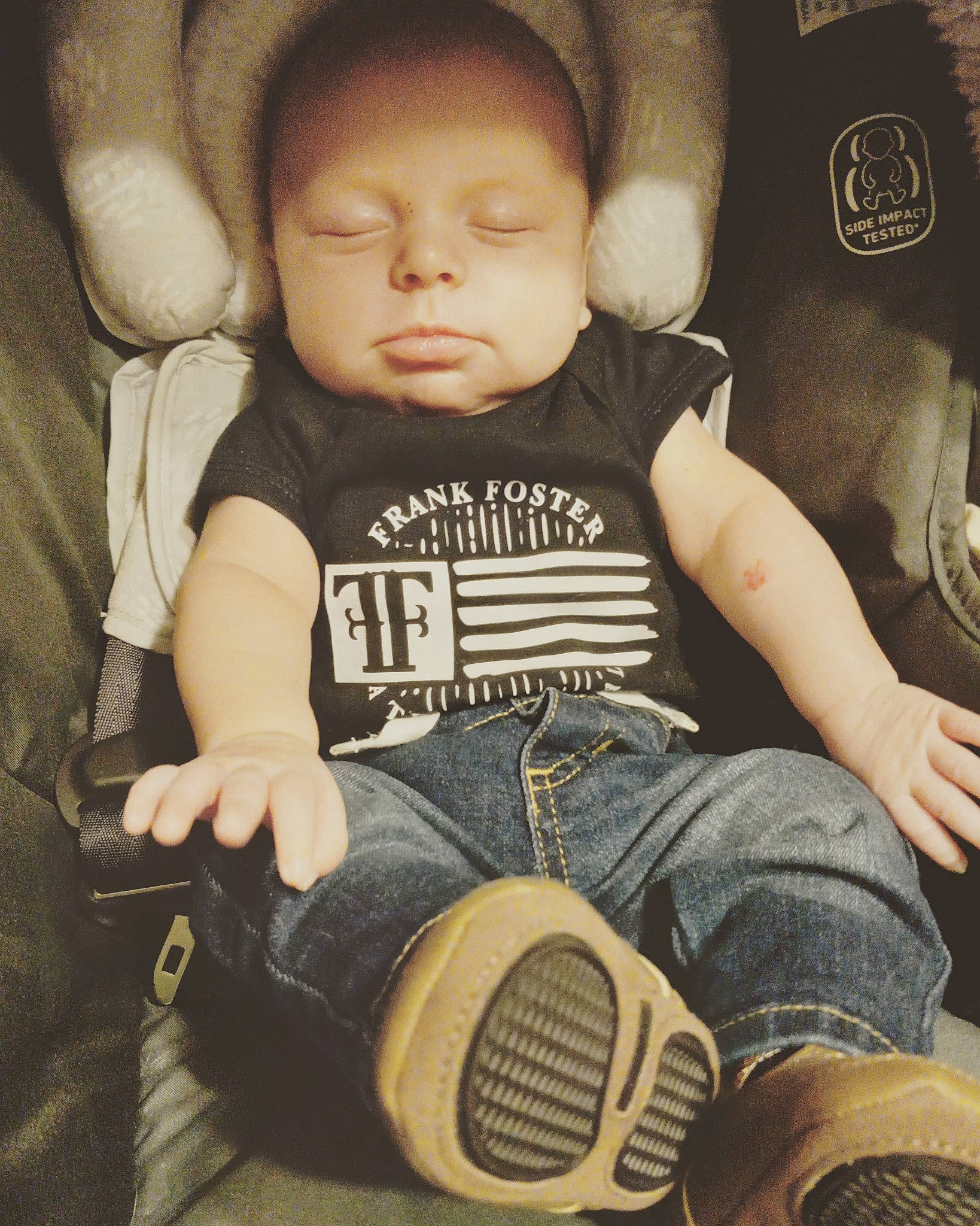 Lukas is registered to the contest to win money with this photo: arm, baby, baby_toddler_clothing, black, cheek, comfort, eye, finger, flash_photography, hand, human, jeans, leg, organ, person, photograph, skin, sleeve, textile, white