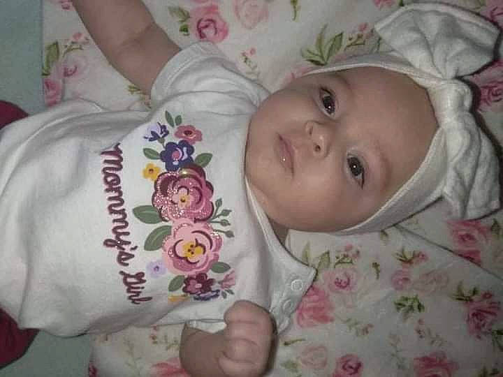 Nyla Amari joined the competition — help win amazing prizes! baby, baby_products, baby_toddler_clothing, cheek, child, dress, eyebrow, eyelash, head, human_body, iris, linens, lip, mouth, nose, person, pink, skin, sleeve, textile