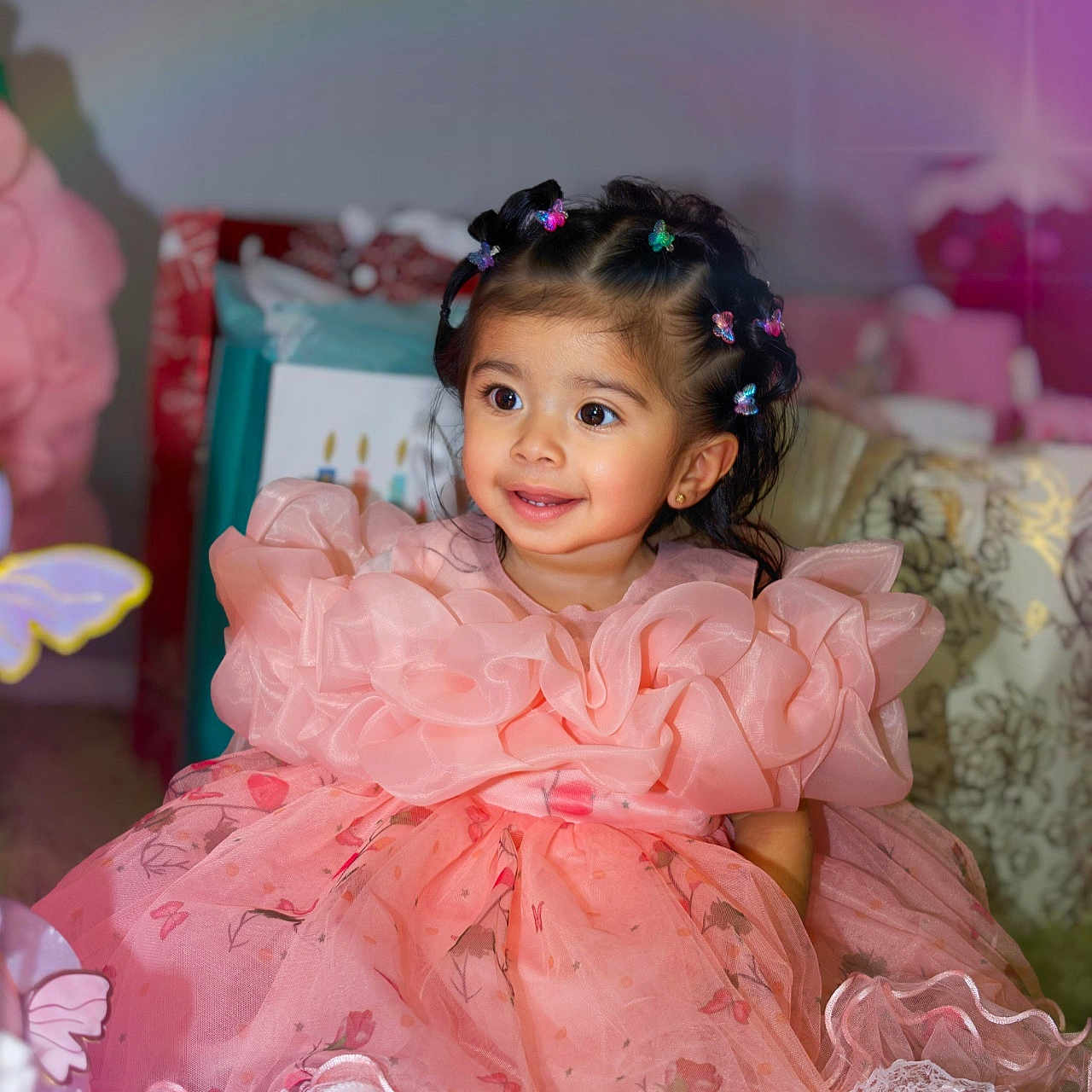 Nelsy Lucia joined the competition — help win amazing prizes! birthday, butterfly_clips, carpet, celebration, child, cute, decorations, dress, gift, girl, hair_clips, happy, indoor, party, person, pink, portrait, sitting, smile, young_child