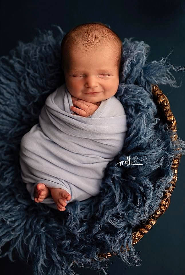 Zealand joined the competition — help win amazing prizes! baby, baby_toddler_clothing, cheek, child, comfort, fashion_accessory, flash_photography, fur, happy, human, iris, outerwear, person, portrait_photography, sitting, skin, sleeve, textile, toddler, wool