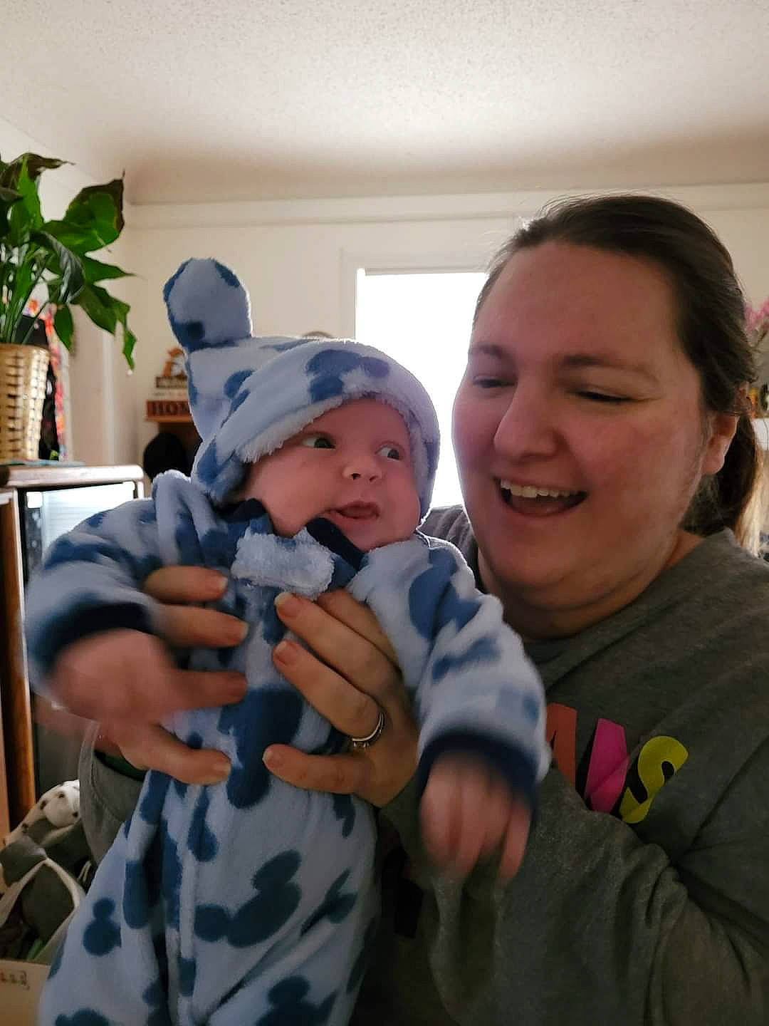 Jayce joined the competition — help win amazing prizes! baby, baby_toddler_clothing, baseball_cap, cap, child, event, flowerpot, fun, gesture, happy, hat, headwear, houseplant, iris, joy, person, plant, sitting, skin, smile