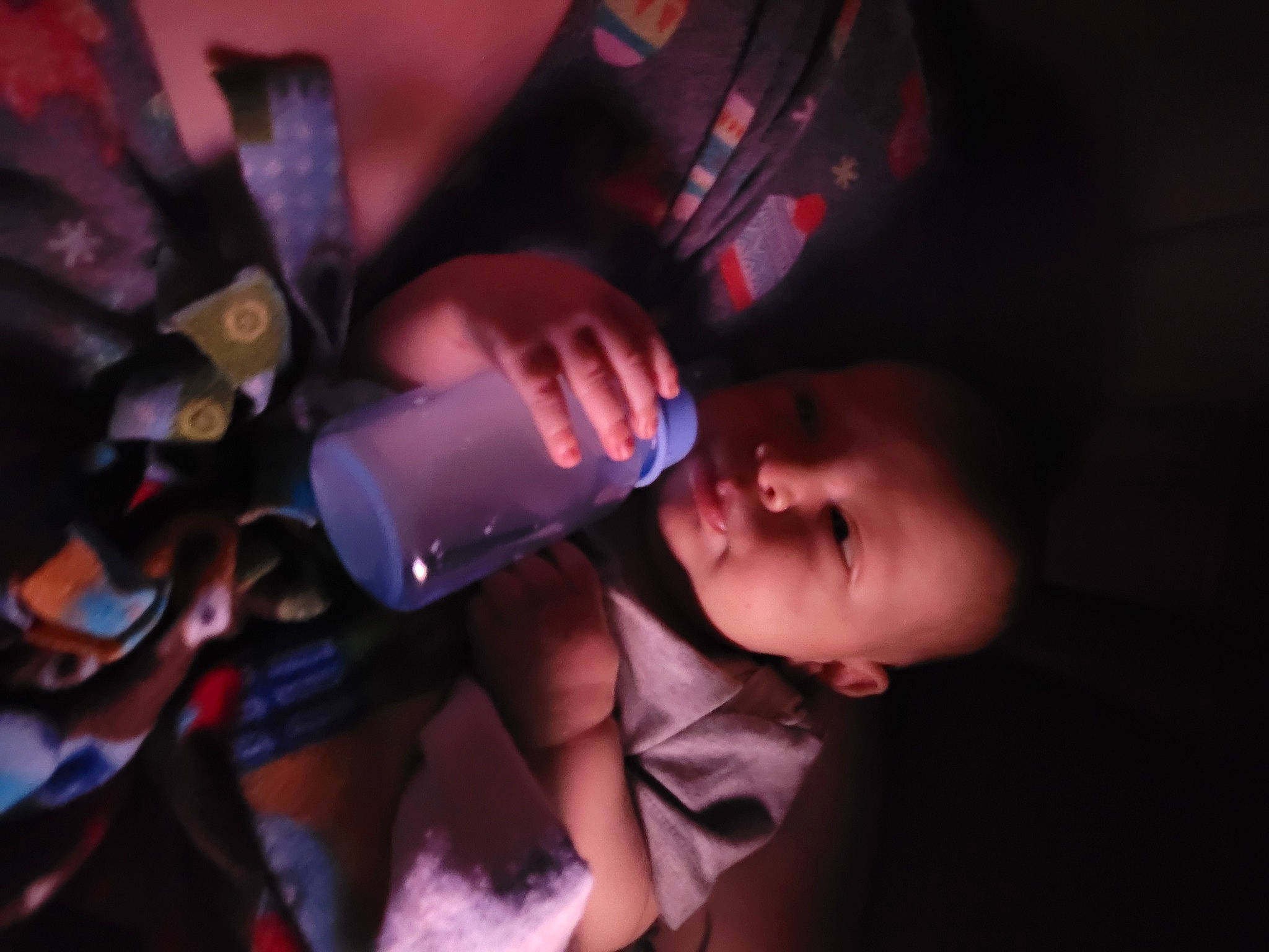 Jayce is registered to the contest to win money with this photo: audio_equipment, automotive_lighting, baby, child, darkness, electric_blue, entertainment, event, finger, flash_photography, fun, magenta, nail, night, person, purple, room, smile, space, toddler