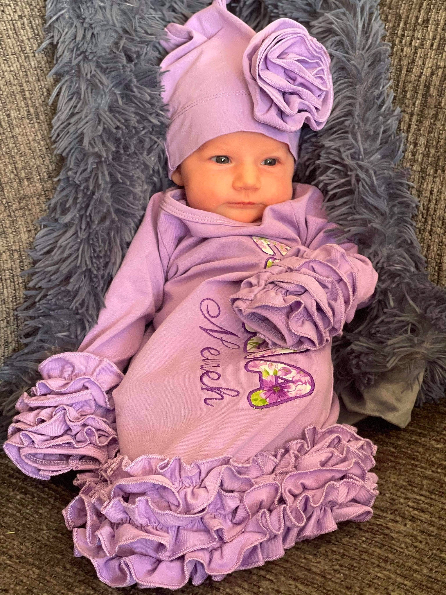 Ellisia is registered to the contest to win money with this photo: art, baby, baby_toddler_clothing, cap, child, clothing, costume_hat, doll, head, headgear, headwear, knit_cap, linens, magenta, person, pink, purple, sleeve, textile, toddler