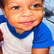 Jahkai Jean joined the competition — help win amazing prizes! baby, infant, child, smiling, face, blue_eyes, onesie, cute, closeup, skin, arm, portrait, happy, young, person, indoors, curly_hair, expression, baby_clothes, soft_lighting