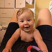 Spring joined the competition — help win amazing prizes! baby, child, smiling, happy, indoor, person, legs, toy, colorful_toy, shorts, face, skin, hair, furniture, drawer, room, crawling, closeup, blue_eyes, expression