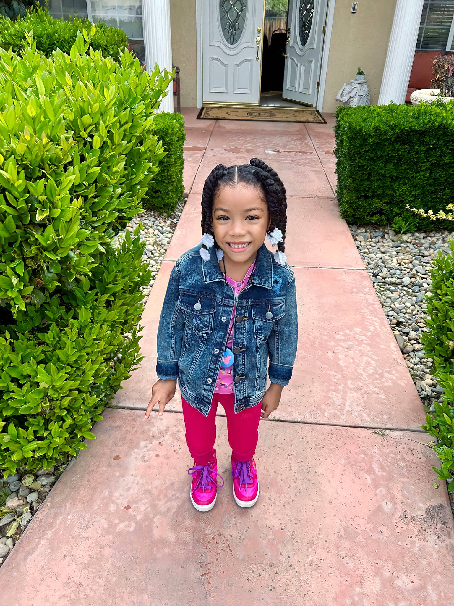 Lee'Ara is registered to the contest to win money with this photo: denim, flooring, garden, grass, groundcover, happy, jacket, joy, lawn, leaf, leisure, magenta, pattern, person, plant, road_surface, shoe, shrub, sidewalk, sleeve