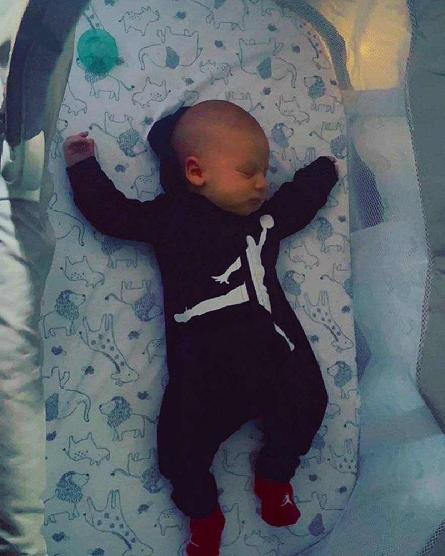 Kyden joined the competition — help win amazing prizes! baby, baby_carriage, baby_products, baby_safety, baby_sleeping, baby_toddler_clothing, comfort, cool, human_body, infant_bed, linens, mammal, outerwear, pattern, person, purple, sleeve, t_shirt, textile, toddler