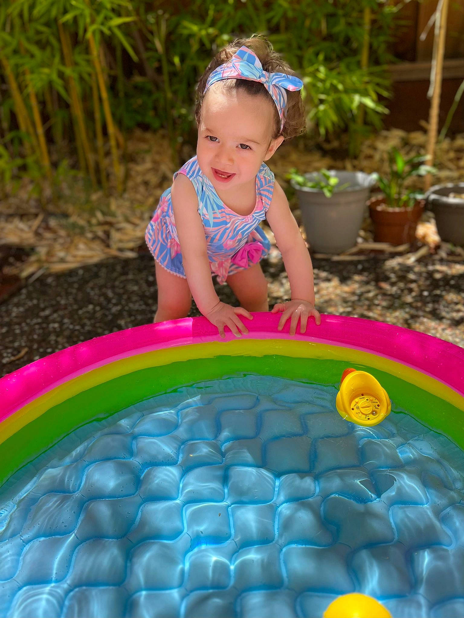 Liana joined the competition — help win amazing prizes! aqua, baby_toddler_clothing, blue, electric_blue, event, face, flowerpot, fun, grass, happy, houseplant, joy, leisure, people, person, plant, recreation, smile, summer, toddler