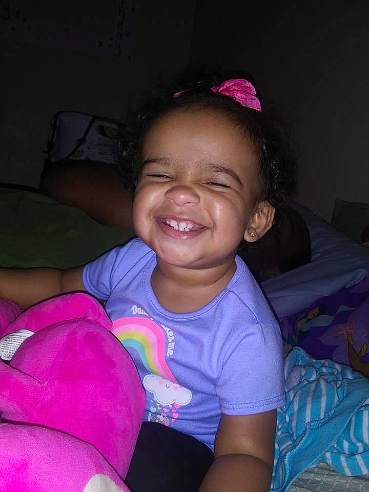 Kaleeah is registered to the contest to win money with this photo: baby, cheek, child, eye, face, facial_expression, fun, happy, head, iris, joy, lip, mouth, neck, people, person, pink, skin, smile, toddler