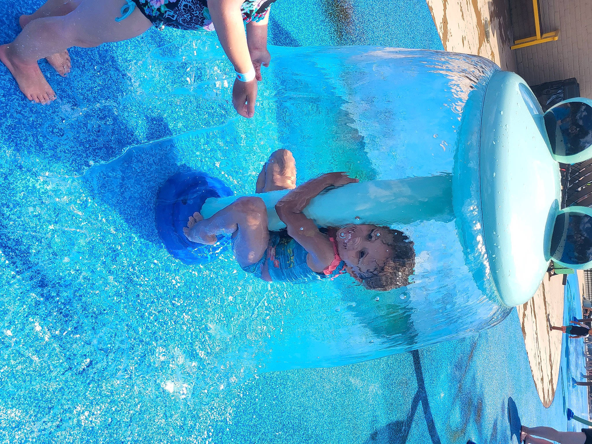 Marlee joined the competition — help win amazing prizes! amusement_park, aqua, azure, blue, chute, circle, electric_blue, foot, fun, leisure, nonbuilding_structure, outdoor_play_equipment, person, playground, recreation, summer, toddler, vacation, water, water_park