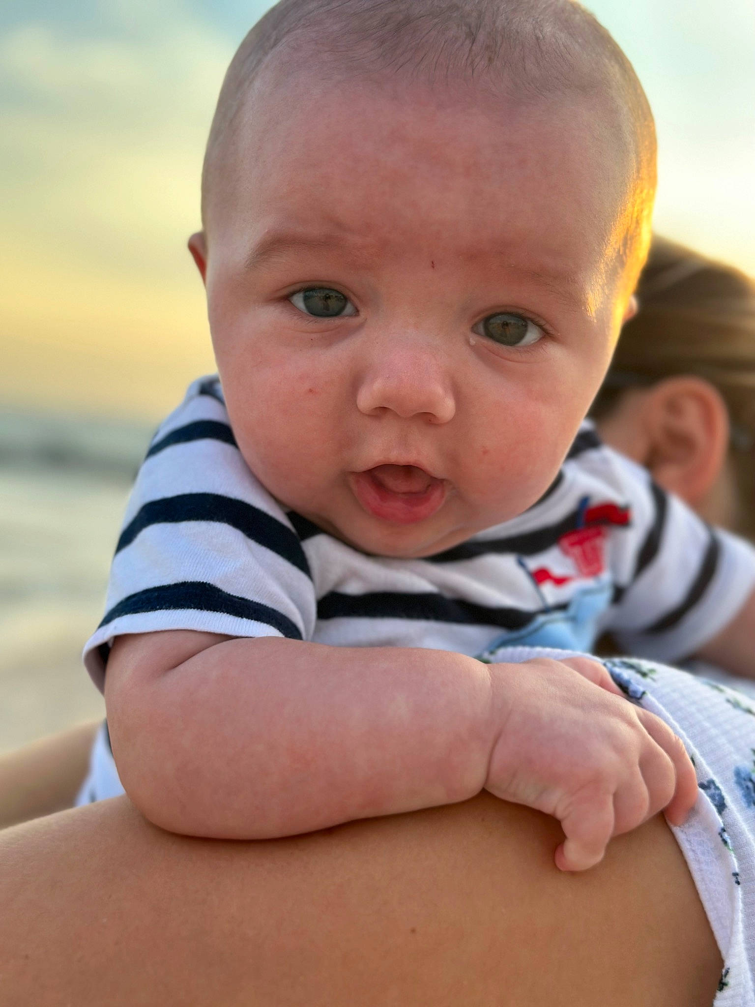 Noah joined the competition — help win amazing prizes! azure, baby, baby_toddler_clothing, cheek, child, comfort, eye, flash_photography, fun, grass, happy, head, iris, nose, person, sitting, skin, sleeve, summer, toddler