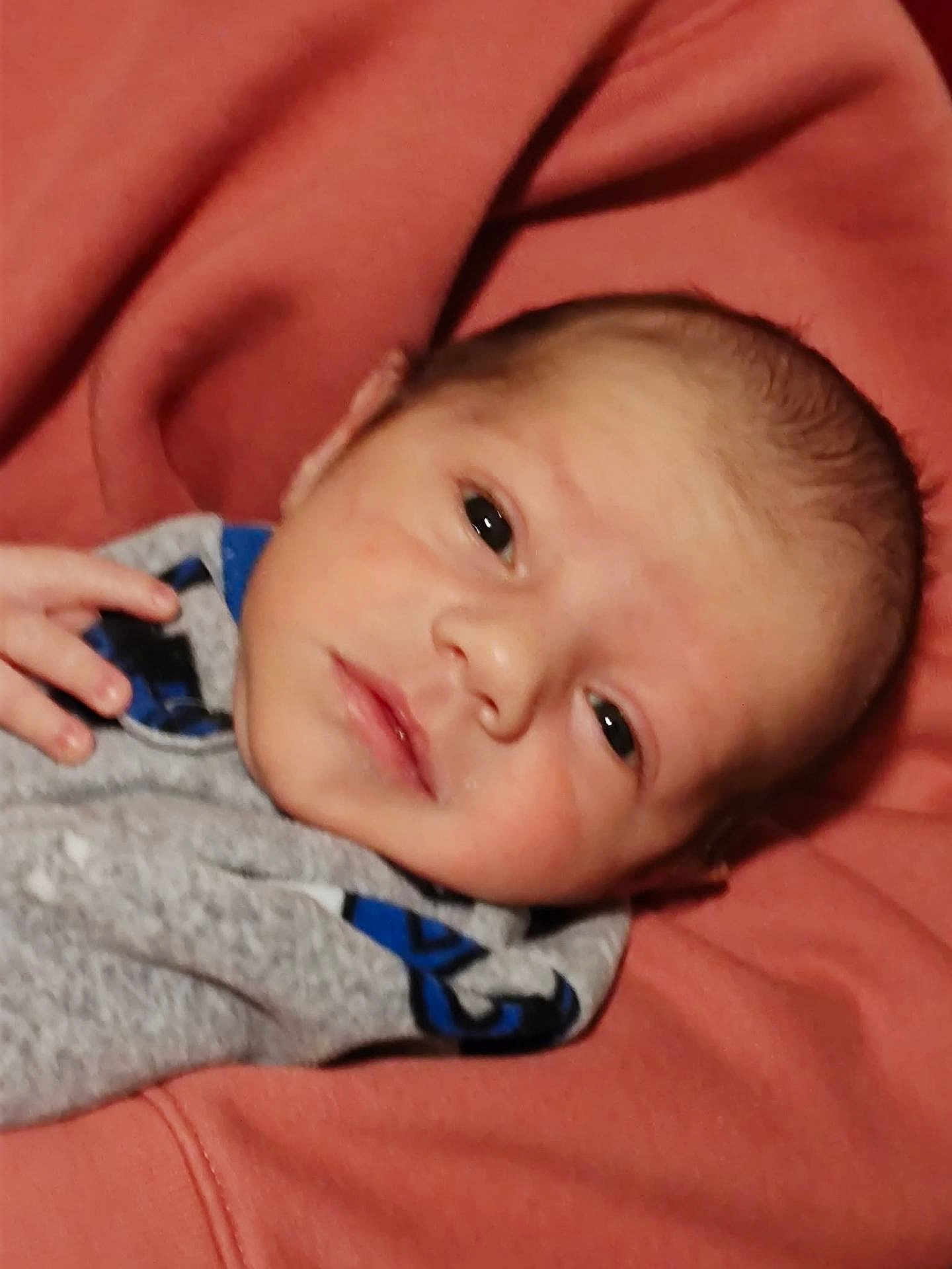 Elias joined the competition — help win amazing prizes! baby, newborn, infant, face, hand, clothing, blanket, soft, resting, cute, person, portrait, closeup, skin, head, eyes, small, child, newborn_baby, cozy