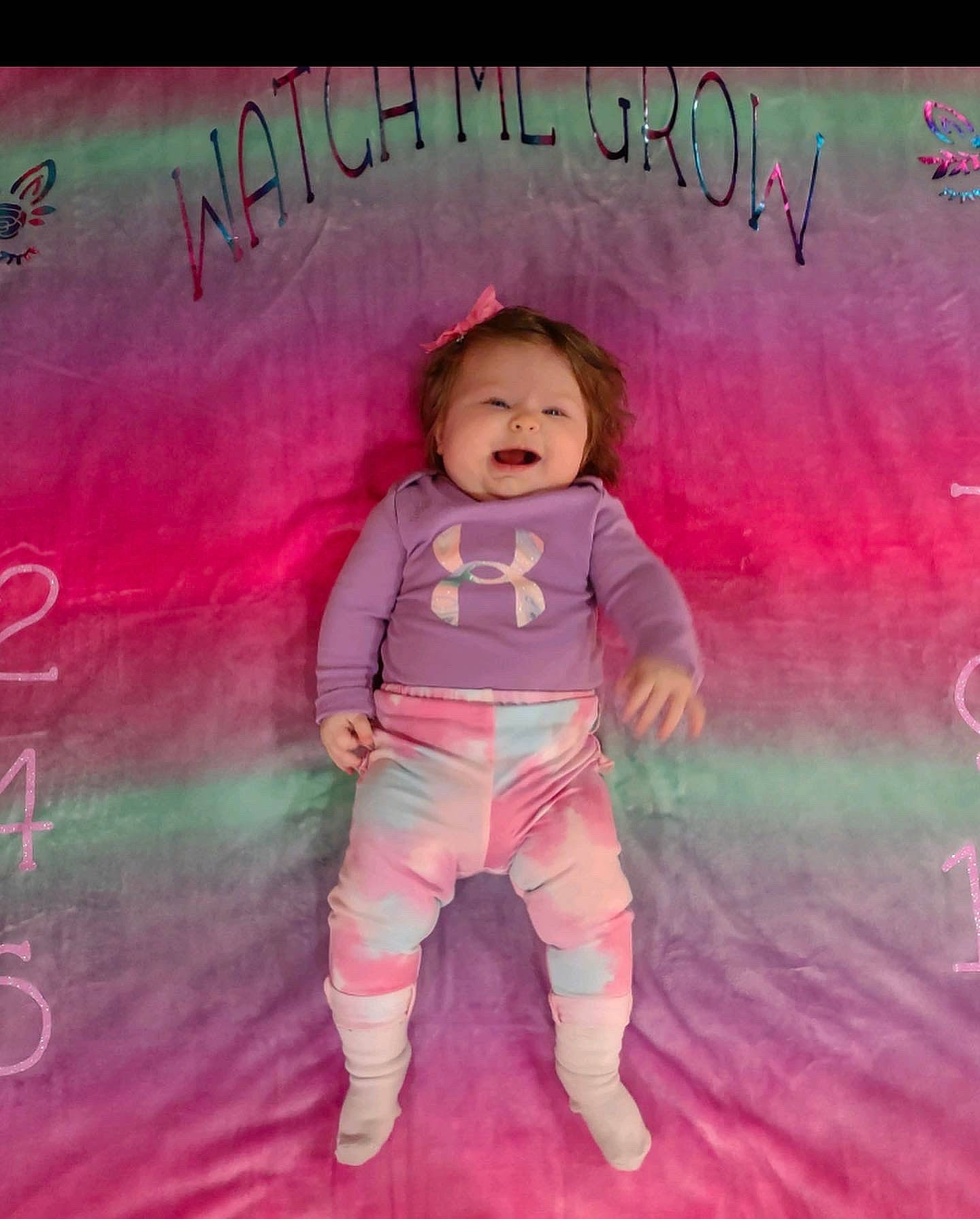 Brystol is registered to the contest to win money with this photo: baby, baby_toddler_clothing, child, cool, flash_photography, font, fun, handwriting, happy, human_body, magenta, outerwear, pattern, person, pink, play, purple, sleeve, t_shirt, toddler