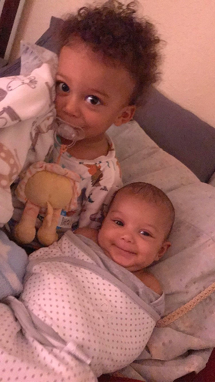 Caira is registered to the contest to win money with this photo: baby, cheek, child, eye, face, iris, joy, person, sibling, skin, smile, toddler