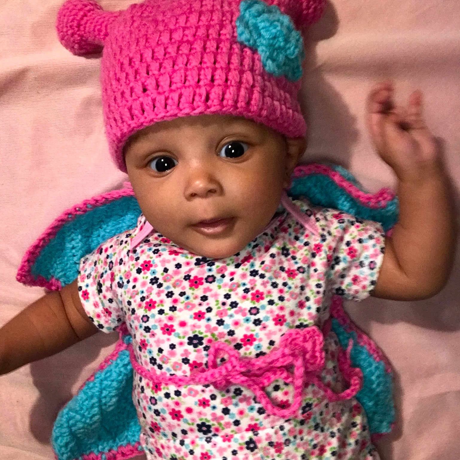 Caira joined the competition — help win amazing prizes! baby, baby_toddler_clothing, beanie, bonnet, cap, child, clothing, costume_accessory, crochet, fashion_accessory, hat, headgear, knit_cap, knitting, magenta, pattern, pink, toddler, wool